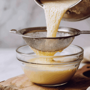 straining blended corn milk for smooth corn milk matcha